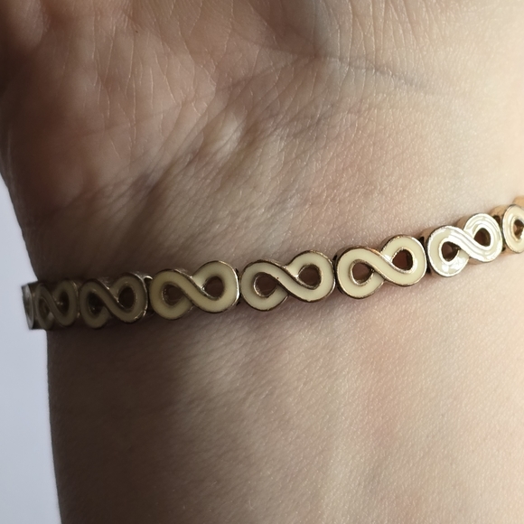 Infinity symbol bracelet stretch cream ivory colored enamel gold tone - Picture 4 of 11